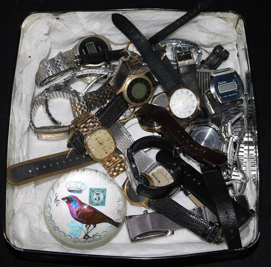 A quantity of watches and a paperweight.